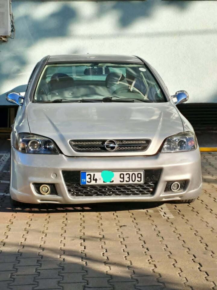 OPEL ASTRA G MERCEKLİ FAR TAKIM SİYAH ZEMİN.